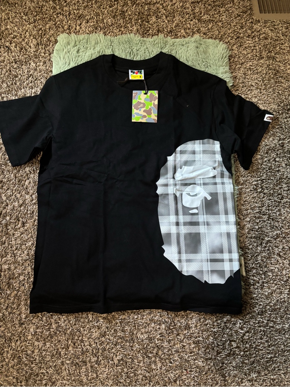 BAPE Black Graphic Tee with Grey Plaid Ape Face